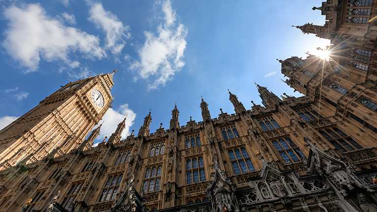 The Houses of Parliament - the Elizabeth Tower tower on a sunny day