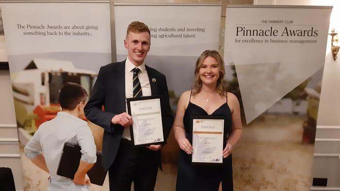 Tim Cotterill and Anna Frick with their awards at the Farmers Club in London